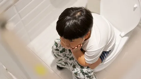 Child in toilet