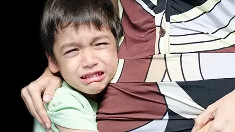 Child crying due to stomach pain